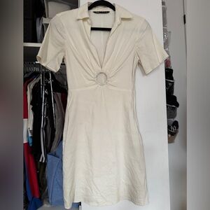 Elegant Cream Dress with Ring Detail